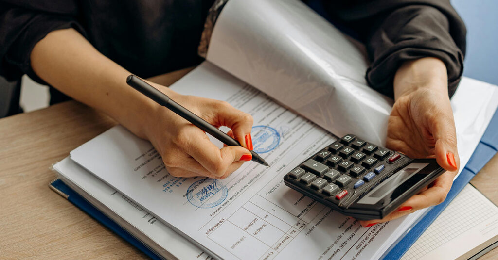Sanctions screening and compliance audit in Australia – business professional reviewing AUSTRAC obligations and AML risk systems.